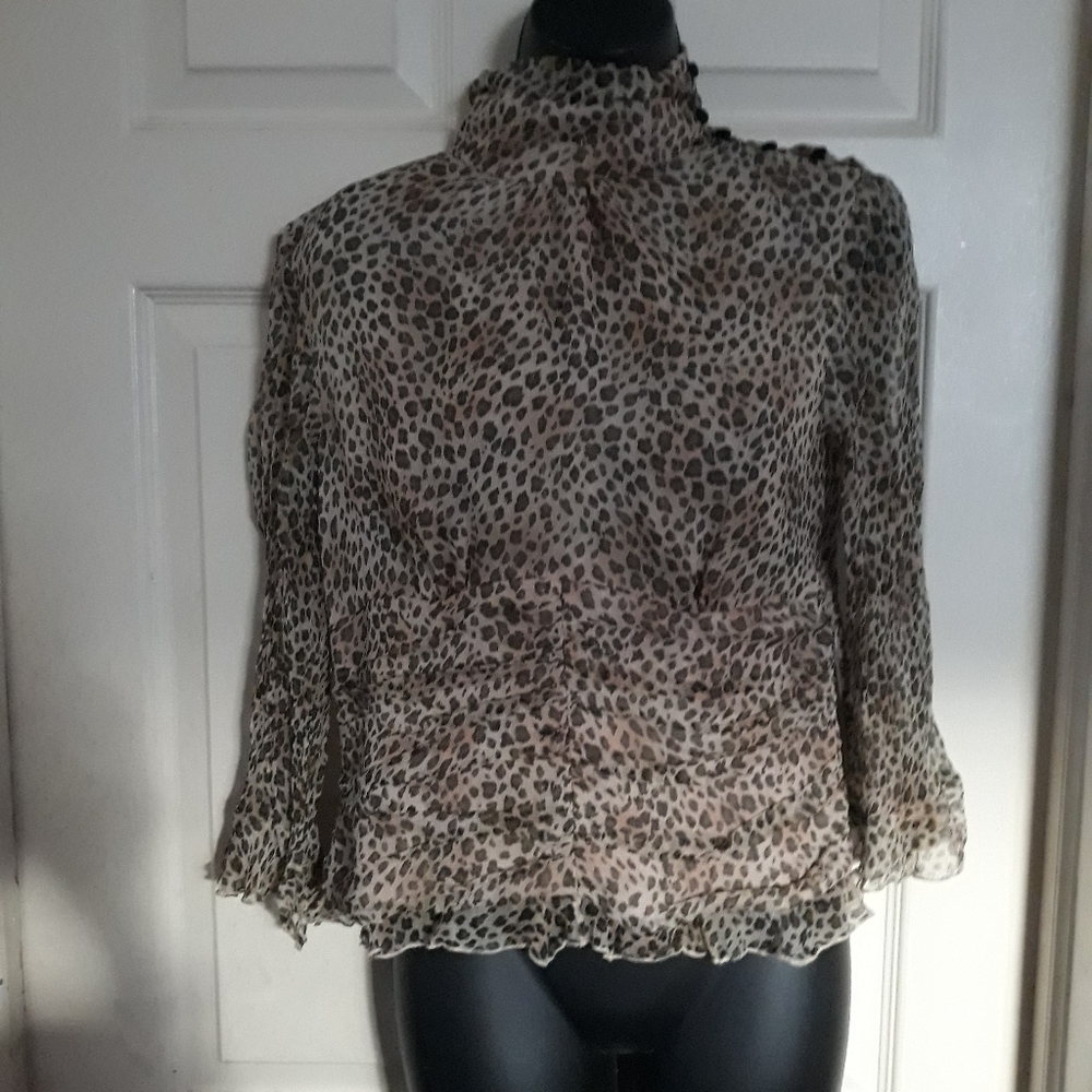 W.D.N.Y.long sleeve blouse cheetah print size medium A- 49 5/$25